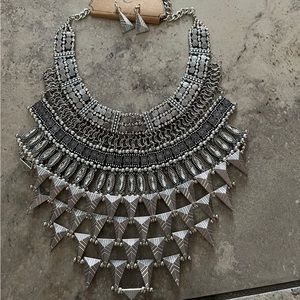 Brand new silver and gold statement necklace